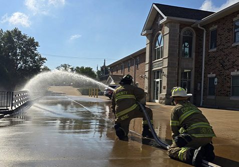 Firefighters training with the hose